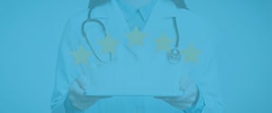 Female doctor with tablet projecting 5 stars.