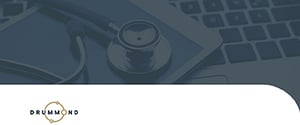 stethoscope on laptop with drummond logo.