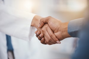 doctor shaking hands